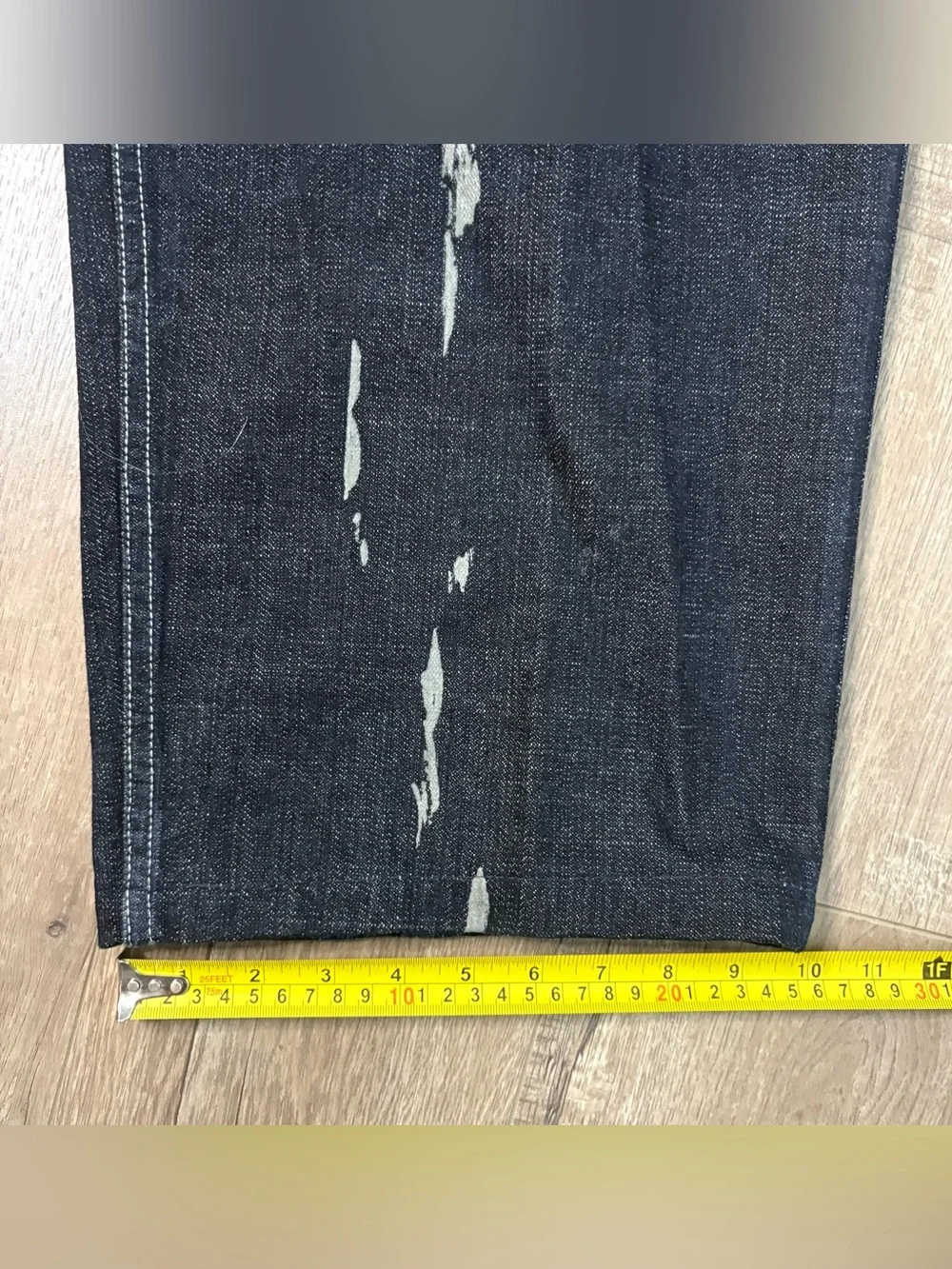 These wide-leg black jeans with white paint splatters Size 36x28